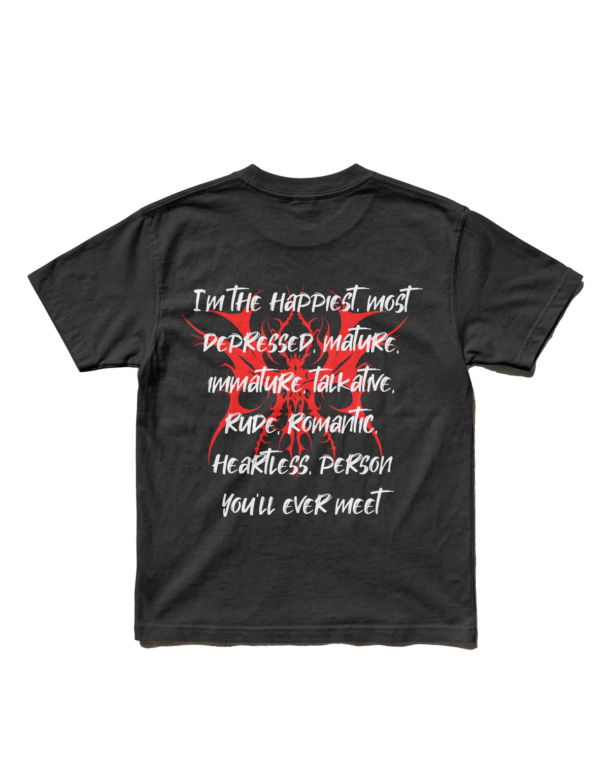 A black short-sleeve t-shirt with a graphic on the front featuring a red demonic skull and white text that reads, 'I'm the happiest, most depressed, immature, talkative, rude, romantic, heartless person you'll ever meet'.